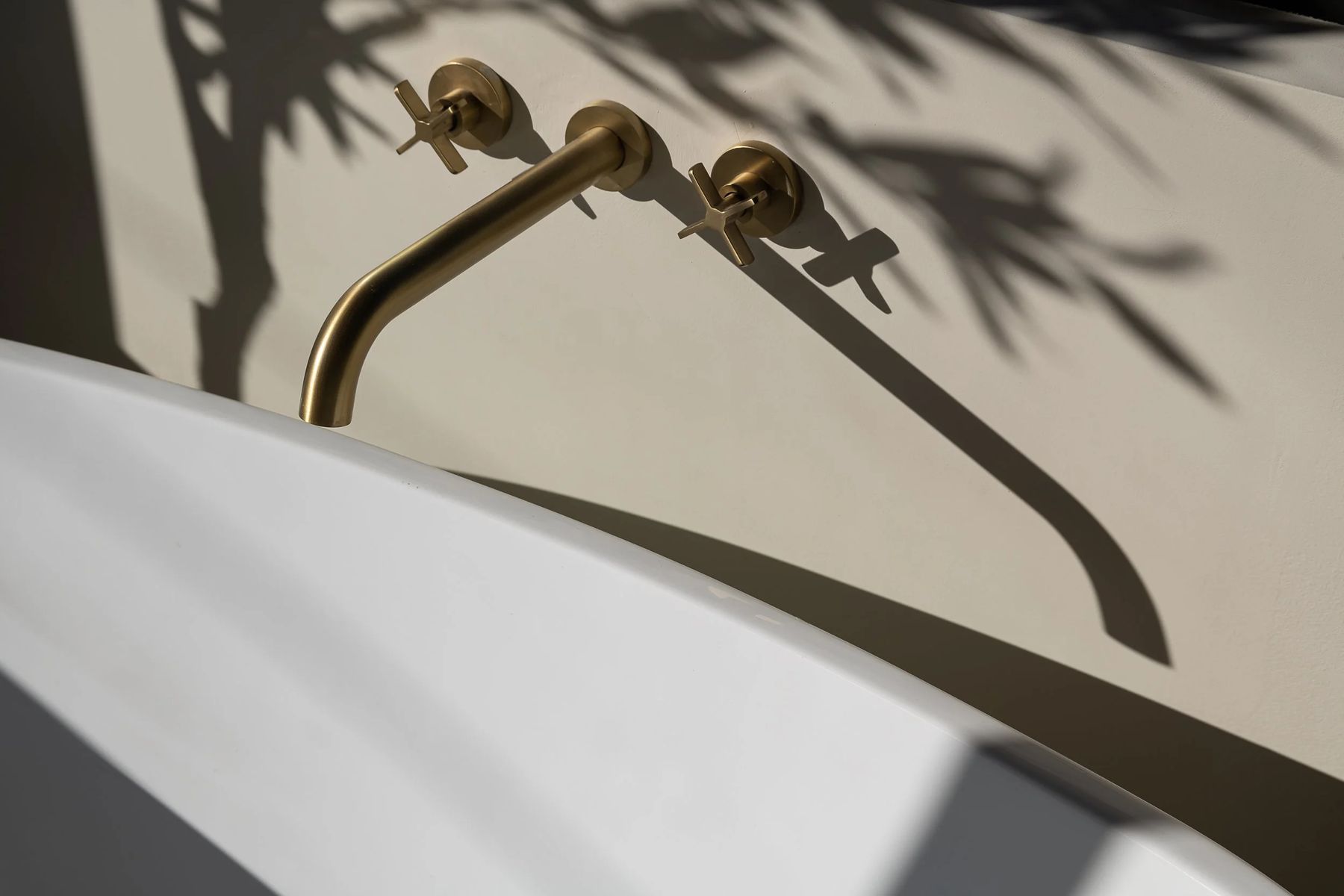 Shadow line across a freestanding tub